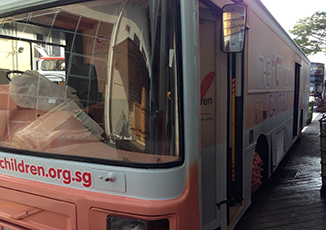 BoxFresh Service - RETRO-FITTINGS WORKS - 'I LOVE CHILDREN' EVENT BUS
